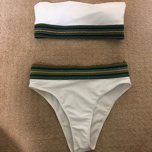 White and green banded swimsuit